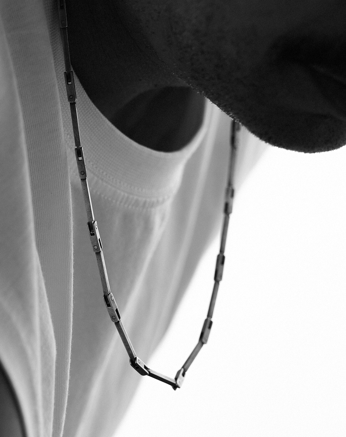 Close-up of a necklace with a blurred background