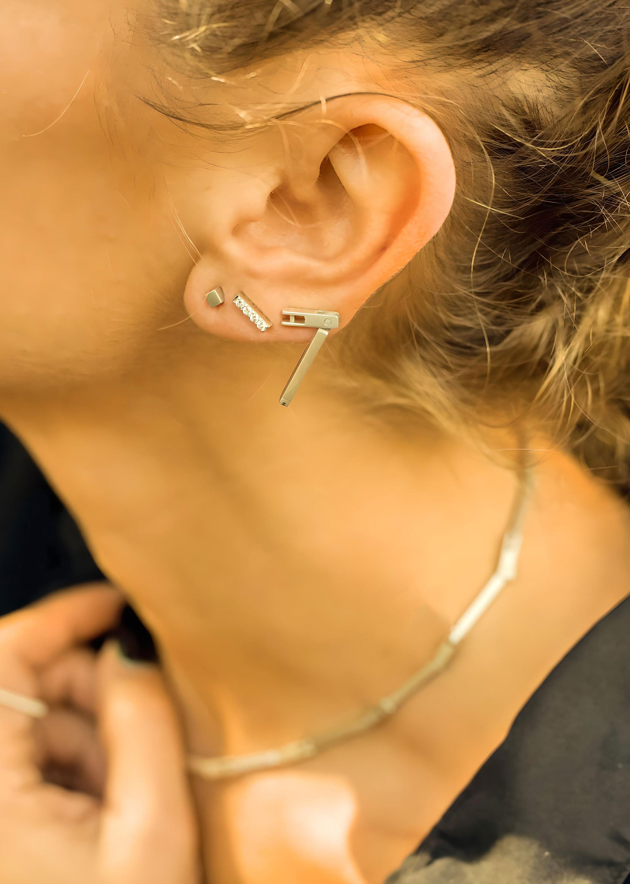 model-wearing-glow-stone-earring-diamond